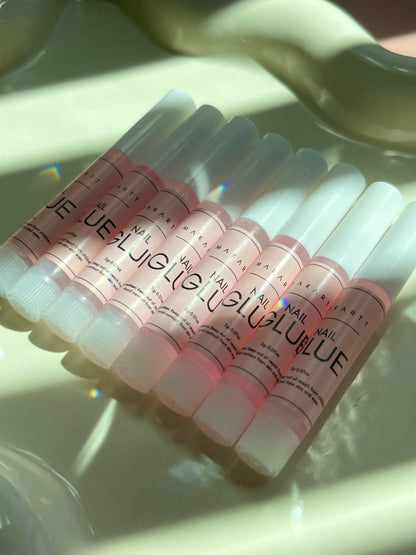 Row of nail gel applicators with visible branding on a light background