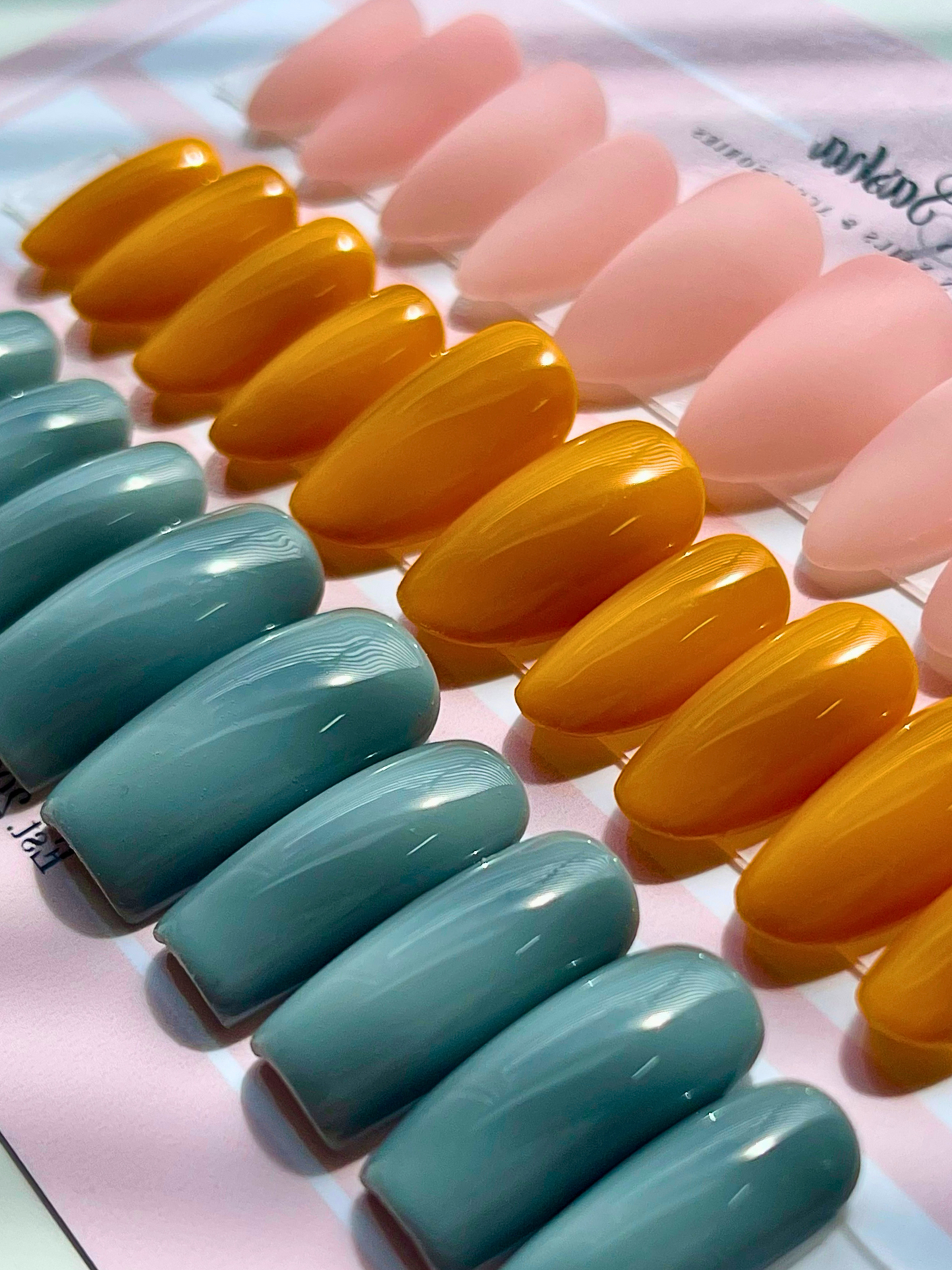 Set of colorful nail samples on a card